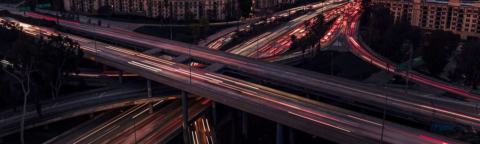 Time lapse photo of a busy urban highway interchange