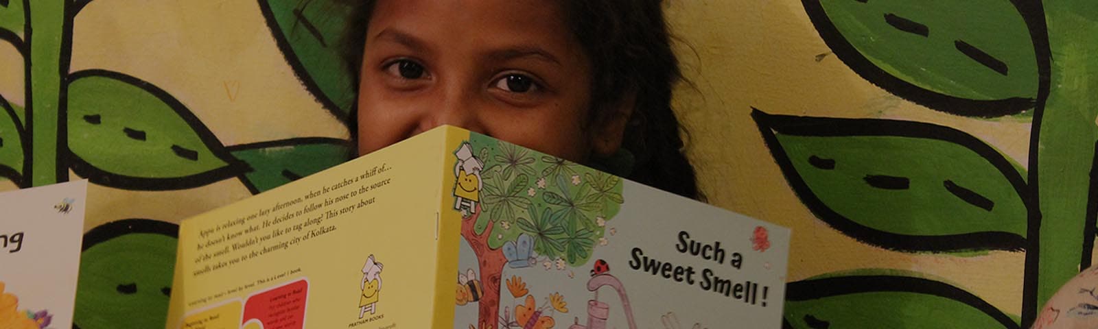 Female student reading book