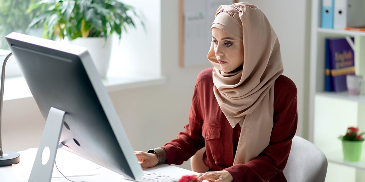 Person working at desk in home office